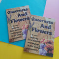 Two printed zine covers titled "Queerness And Flowers" are shown on a colourful pastel background. The covers feature floral artwork, lavender illustrations, and text about exploring floral symbols and language in the queer community.
