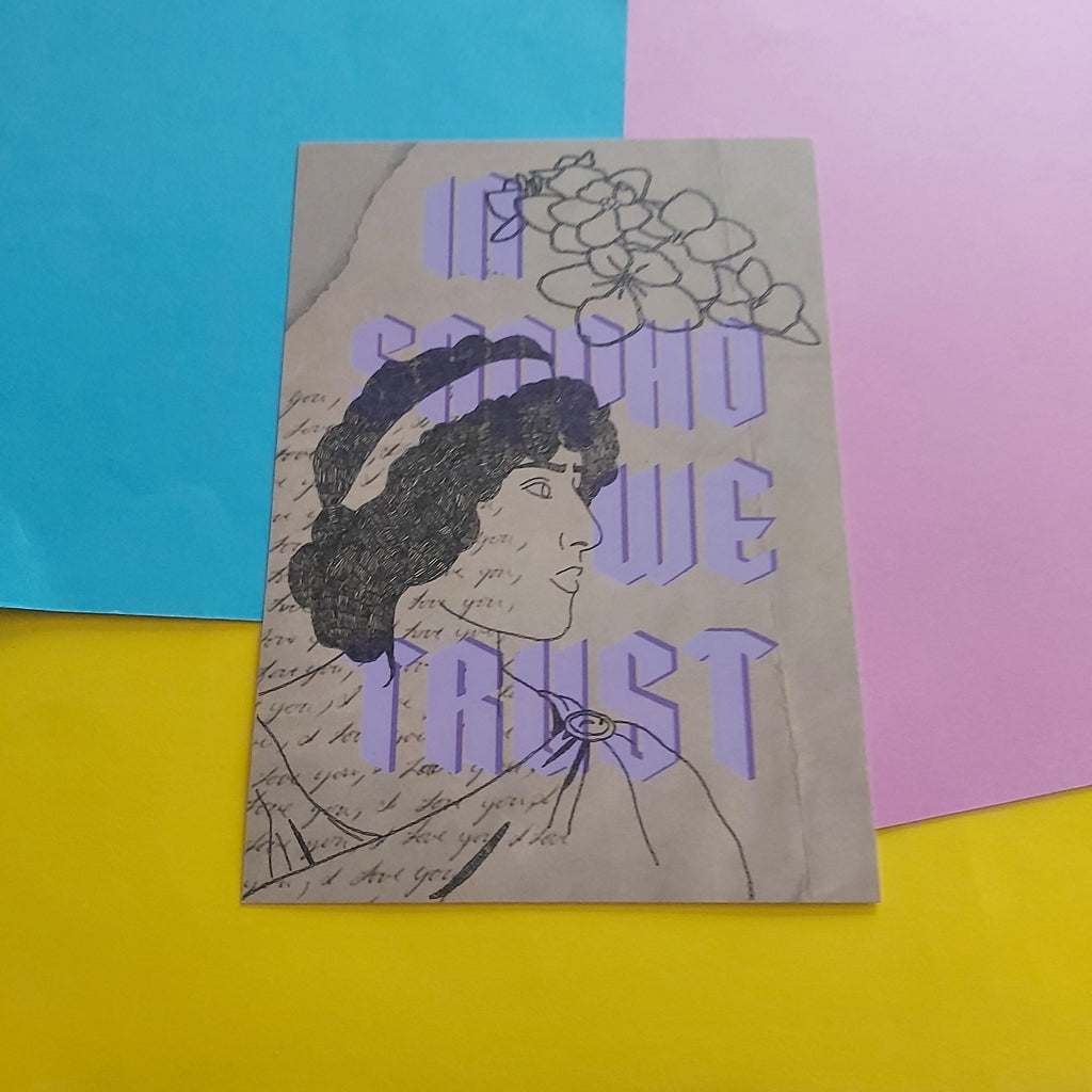 A vintage-style art print with the text 'IN SAPPHO WE TRUST' in purple over a sketch of a woman's profile and flowers, placed on a colourful background of blue, pink, and yellow sheets.