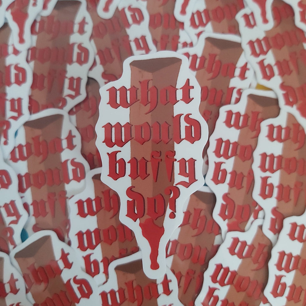 A close-up of multiple die-cut stickers layered on top of each other, featuring the phrase 'what would Buffy do?' in red Gothic-style lettering over a brown silhouette of a wooden stake, with white sticker borders.