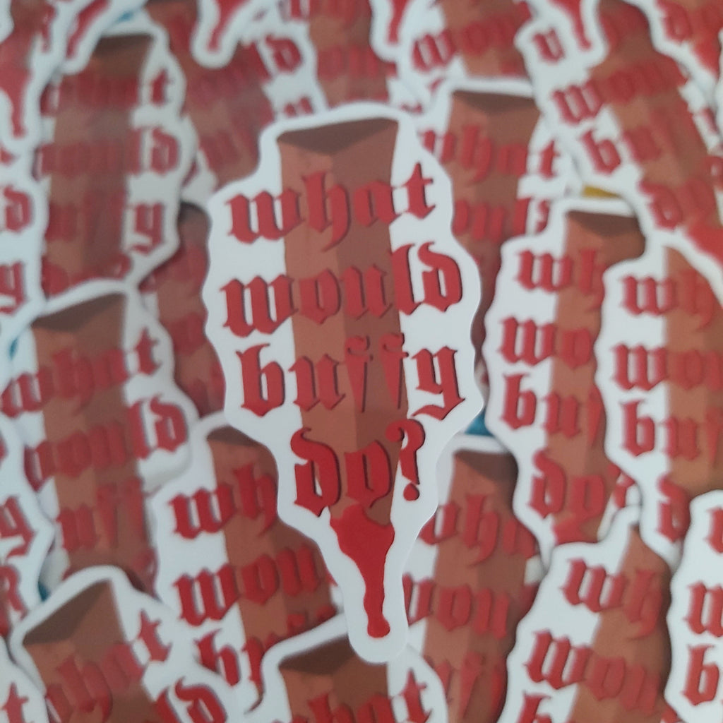 A close-up of multiple die-cut stickers featuring a bloody stake graphic and the gothic text 'what would Buffy do?' in red, layered over a white background.