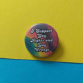 A round pinback button with a colourful tie-dye pattern and the text 'I Support Gay Rights and Gay Wrons' in white lettering, placed on a yellow and blue background.