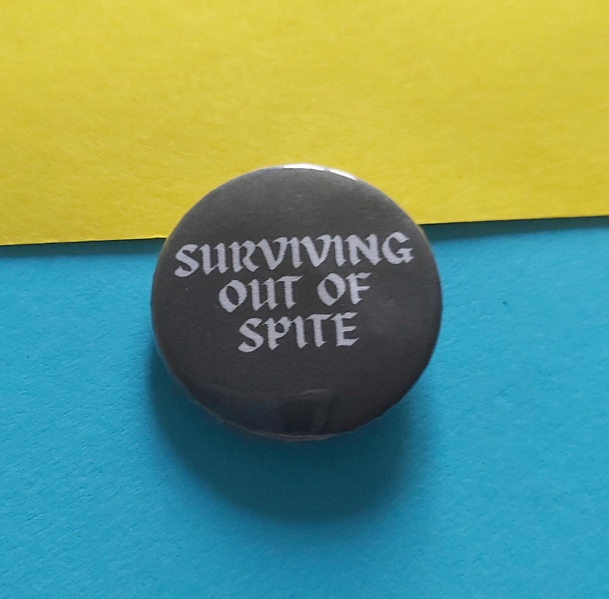 Surviving Out Of Spite Fun Novelty 32mm Button Badge Pin Gothic Goth Alternative Humor