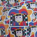 A close-up of multiple cartoon stickers featuring a stylised character with large eyes, black hair, and a red-and-blue jester-like hat, arranged overlapping on a white background.